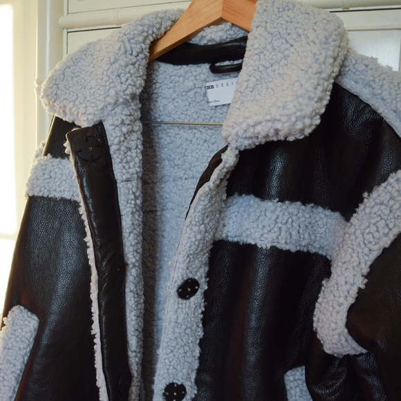 ASOS Design sherpa paneled jacket in black and blue - Picture 6 of 8